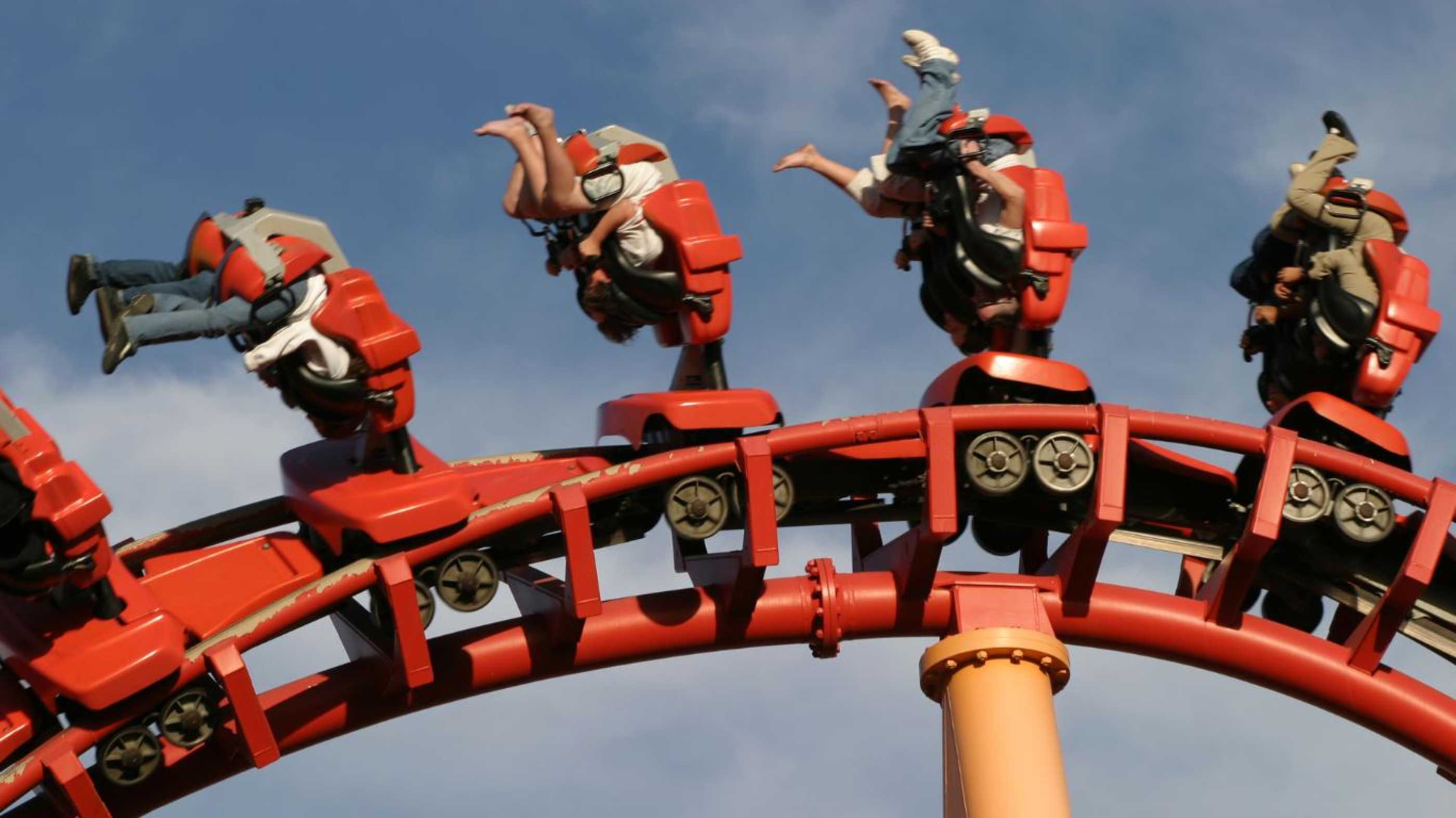 People upside down on a rollercoaster