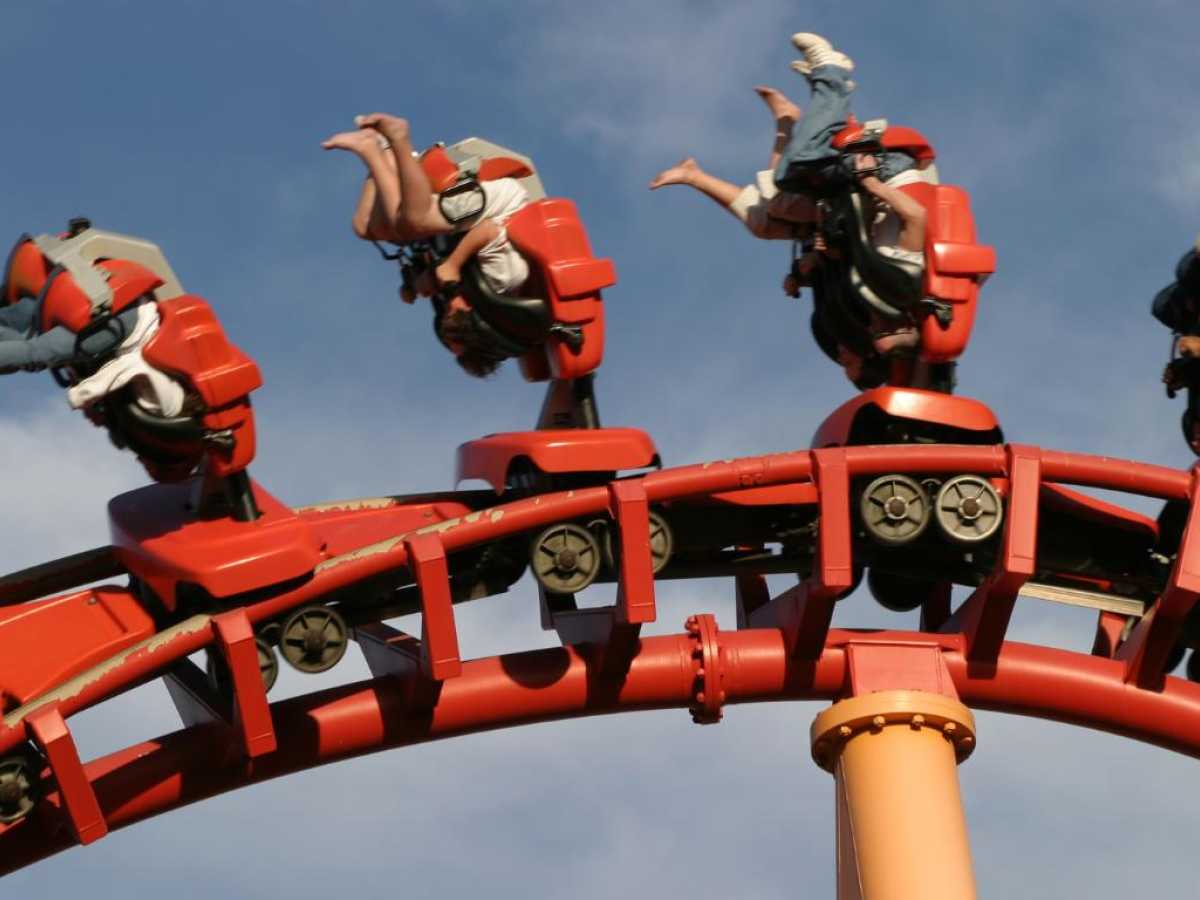 People upside down on a rollercoaster